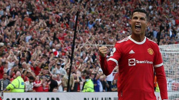 Cristiano Ronaldo celebrating after scoring on his return to Manchester United