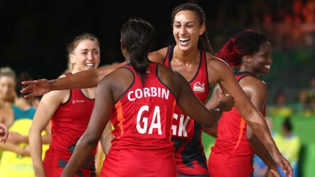 Jade Clarke (far left) and Geva Mentor (second from right) celebrate with Sasha Corbin and Ama Agbeze after winning Commonwealth Games gold in 2018