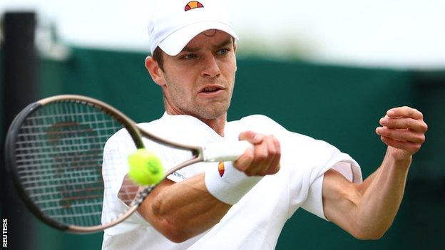 Alastair Gray hits a forehand during his Wimbledon second-round match against Taylor Fritz