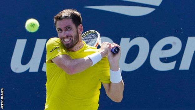 Cameron Norrie hits a return against Holger Rune at the US Open in New York
