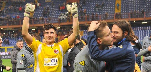 Alessandria's goalkeeper Giammarco Vannucchi (left) celebrates with team-mates
