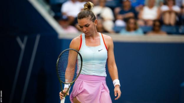 Simona Halep looks despondent at the 2022 US Open