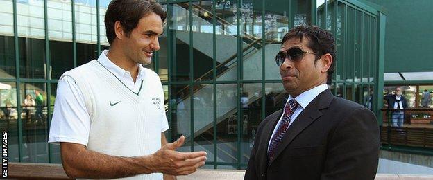 Sachin Tendulkar and Roger Federer in conversation at Wimbledon in 2011