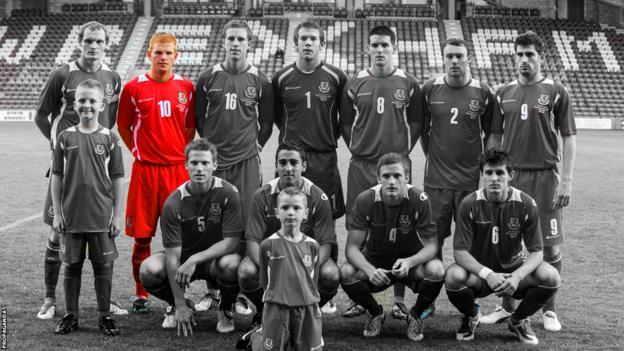 Wales Under-21s line up before playing Hungary in Wrexham in August 2009. Marc Williams, back row, is picked out in red in a black and white image
