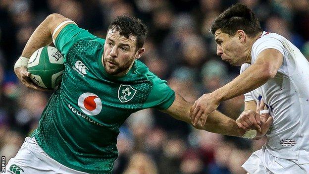 Robbie Henshaw gets a tug from England's Ben Youngs in last year's Six Nations game in Dublin