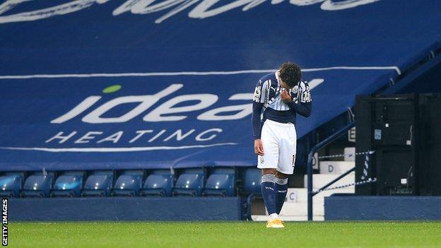 Matheus Pereira walks after receiving a red card