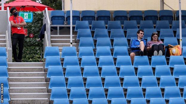 Spectators watch Ons Jabeur and Andrea Petkovic at Melbourne Park