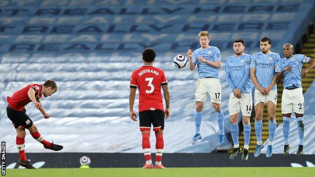 James Ward-Prowse takes a free-kick against Manchester City