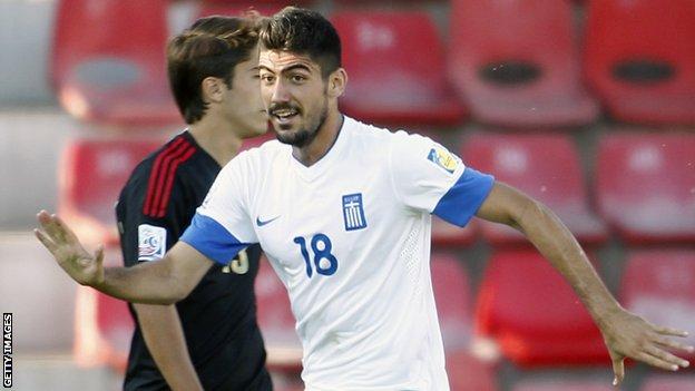 Andreas Bouchalakis: Nottingham Forest sign Olympiacos midfielder - BBC ...