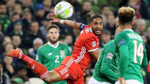 Wales captain Ashley Williams clears as the Republic of Ireland press for a goal in Dublin
