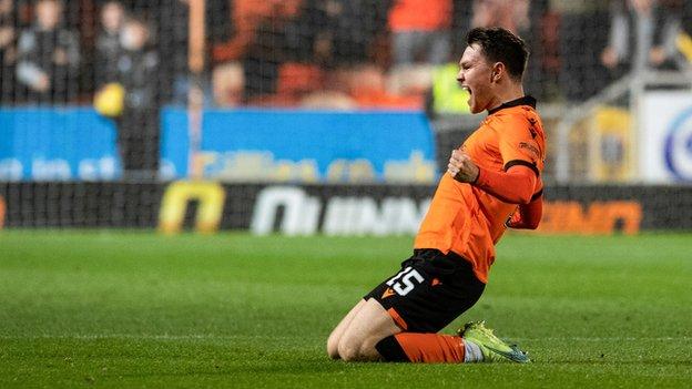 Glenn Middleton celebrates after whipping in United's third