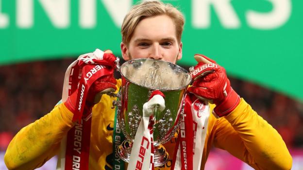 Liverpool goalkeeper Caoimhin Kelleher with the Carabao Cup