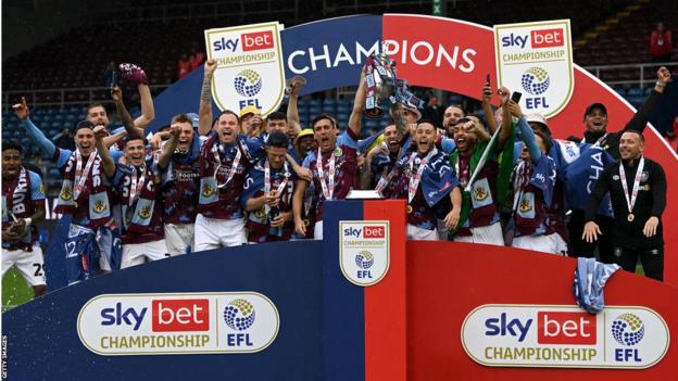 Burnley celebrate after winning the Championship title