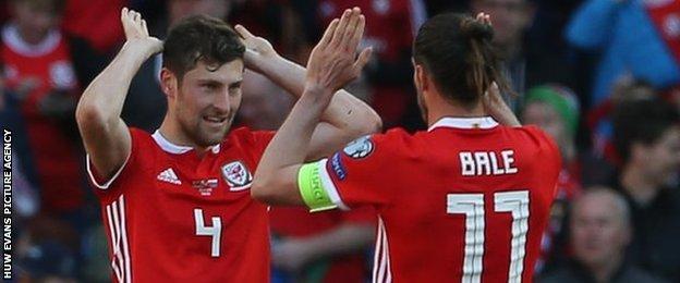 Ben Davies (left) celebrates Wales' opening Euro 2020 qualifying win over Slovakia with Gareth Bale