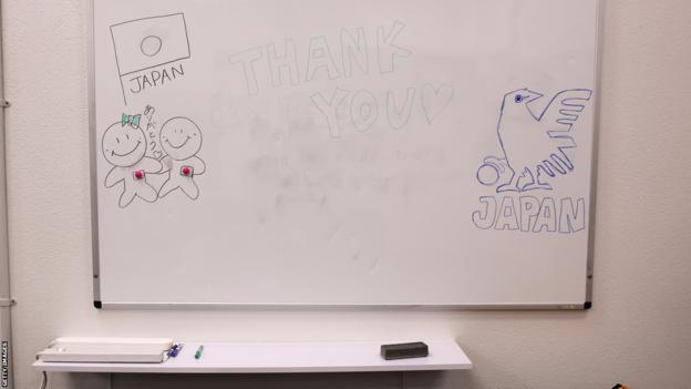 A thank you message is seen on the white board in Japan's dressing room in Wellington at the 2023 Fifa Women's World Cup
