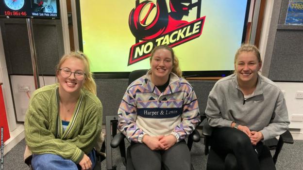 Gloucester-Hartpury back-rower Gwen Crabb (centre) with No Tackle podcast hosts Millie Wood and Enya Lackie
