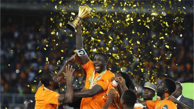 Yaya Toure lifts the trophy after captaining Ivory Coast to Africa Cup of Nations glory