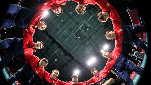  China's badminton team cheer in a circle before the Uber Cup final against Japan on day eight of the Thomas & Uber Cup in Aarhus, Denmark