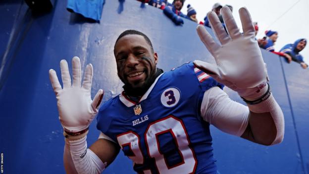 Buffalo Bills running back Nyheim Hines puts up his hands in celebration after victory over the New England patriots