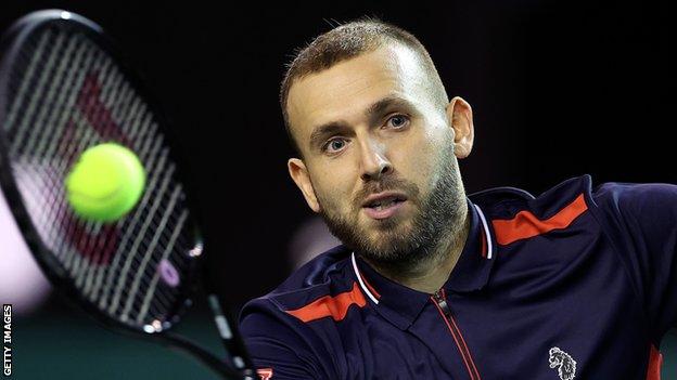 Dan Evans in action during his Paris Masters first-round match against Brandon Nakashima