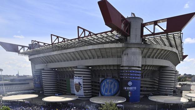 Inter Milan fans celebrate a league title win outside San Siro