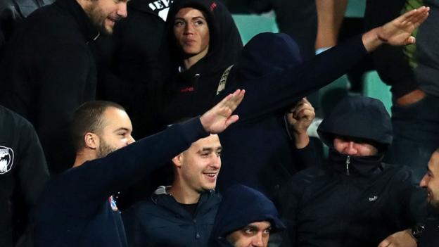 Bulgarian fans make Nazi salutes at a game against England