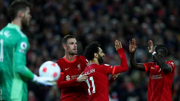 Liverpool celebrate their fourth goal during their 4-0 win over Manchester United at Anfield in April 2022