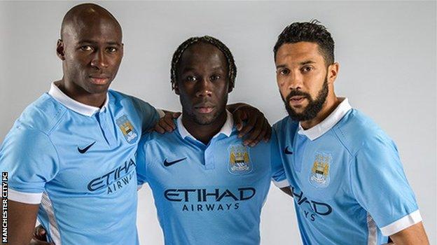 Eliaquim Mangala, Bacary Sagna and Gael Clichy model Manchester City's new home kit