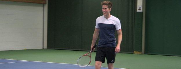 Ross Fiddes on a tennis court
