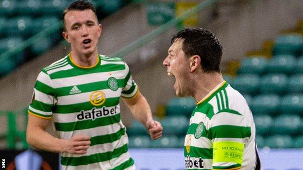 Celtic's David Turnbull and Callum McGregor celebrate