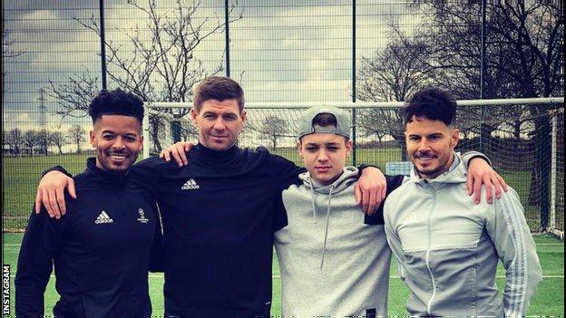 Donovan Hunt, Steven Gerrard, Billy Wingrove and Jeremy Lynch at Liverpool's Melwood training ground.