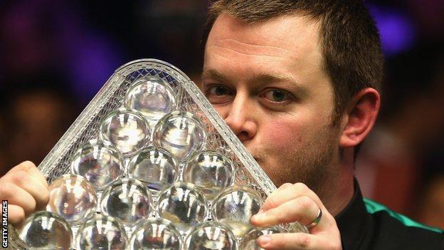 Mark Allen kisses the Masters trophy