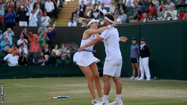 Alicia Barnett and Jonny O'Mara celebrate beating Venus Williams and Jamie Murray