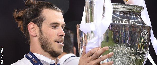 Gareth Bale with Champions League trophy