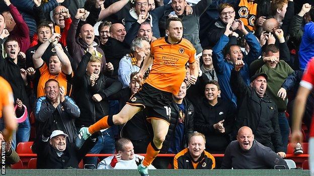 Diogo Jota celebrates the first of his two goal for Wolves against Forest at the City Ground