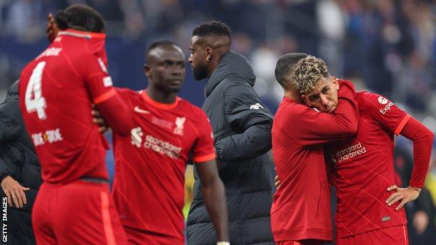 Dejected Liverpool players