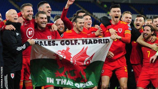 Wales players celebrate after beating Hungary