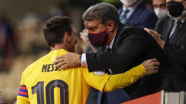 Barcelona president Joan Laporta embraces Lionel Messi in 2021