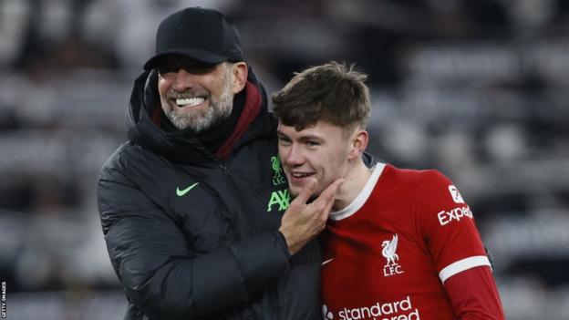 Jurgen Klopp and Conor Bradley pictured after Liverpool's win over LASK