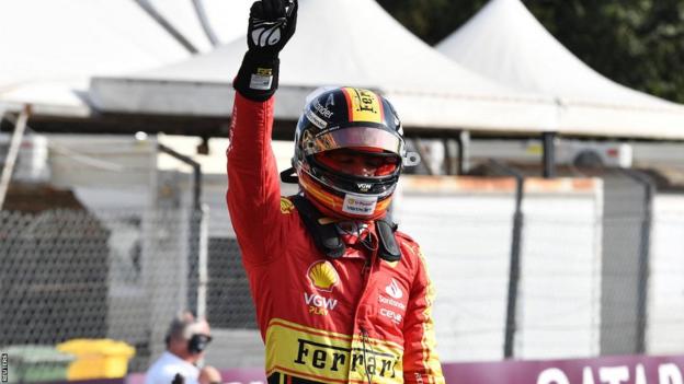 Carlos Sainz celebrates taking Italian GP pole