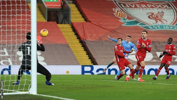 Man City put four past Reds at Anfield 1 Phil Foden scores Manchester City's fourth goal in their win at Liverpool