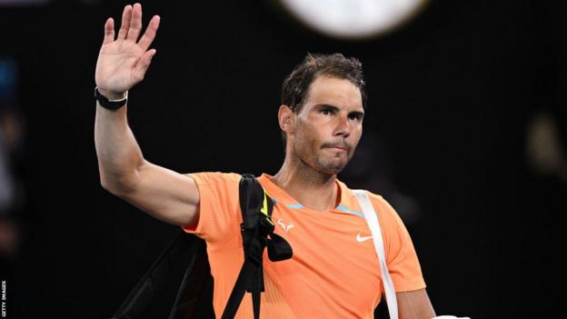 Rafael Nadal leaves the court after losing his second round match at the Australian Open