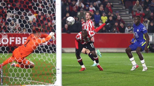 Chelsea keeper Kepa Arrizabalaga makes a save during his side's Carabao Cup quarter-final with Brentford