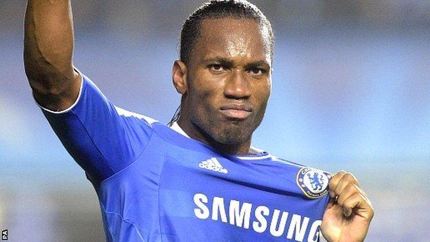 Didier Drogba celebrates scoring against Napoli in the Champions League in 2011-12