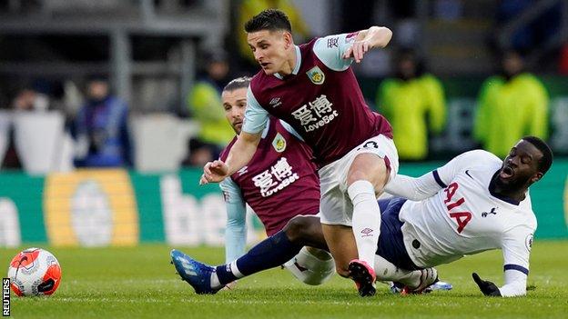 Tanguy Ndombele tackles Ashley Westwood in the 1-1 draw between Burnley and Tottenham