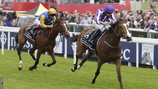 Minding (right) wins the Oaks ahead of Architecture (left)