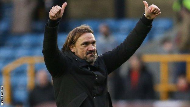 Norwich manager Daniel Farke salutes fans after their victory at Millwall