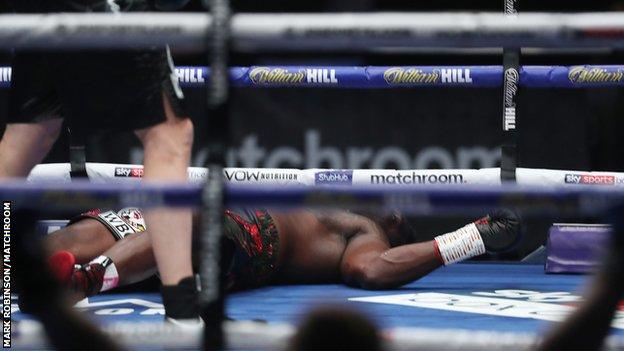 Dillian Whyte on the canvas after being knocked out by Alexander Povetkin