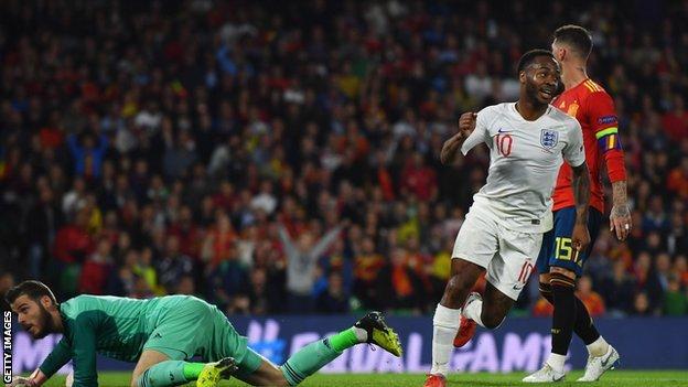 Raheem Sterling celebrates after putting England 3-0 up against Spain
