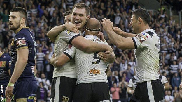 Scott Taylor, Danny Houghton and Mark Minichello celebrate the Hull FC second try